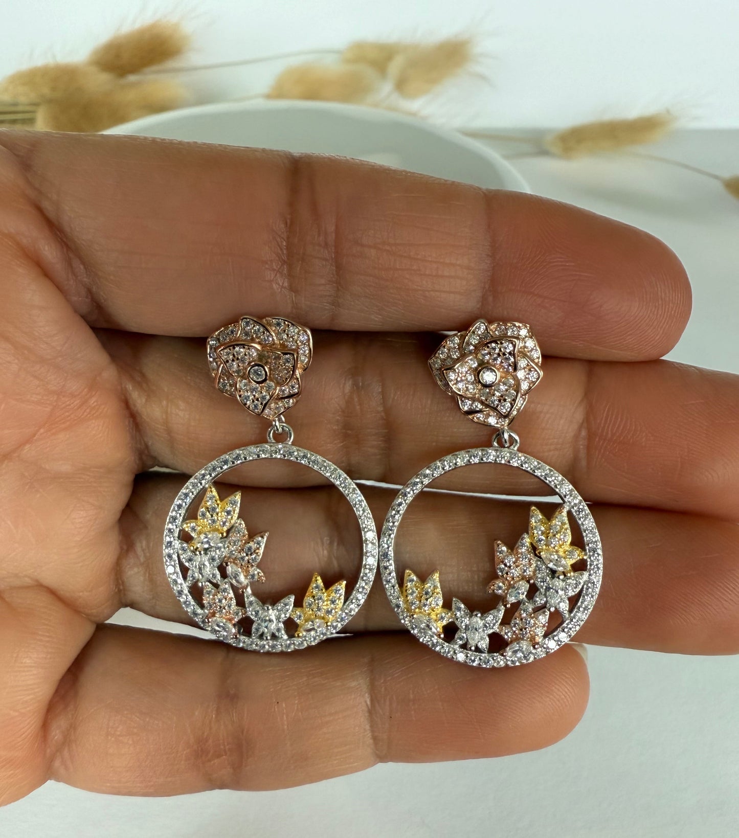 Aritos en Plata925 tres oros, mariposas y flores