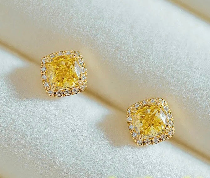 Aritos de oro con zircon amarillo