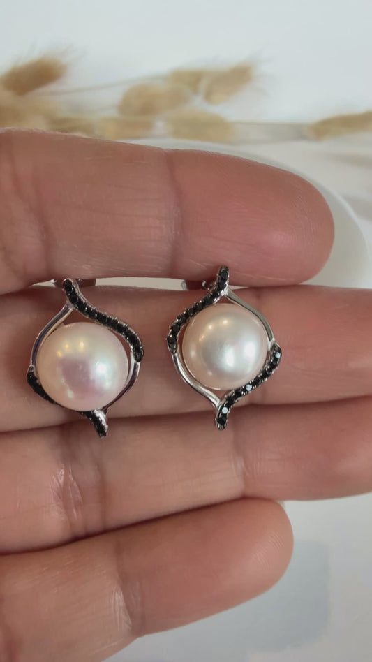 Aritos de perla natural de Río, con Zircones negros en plata925