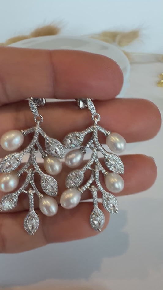 Aritos de perlas naturales de rio, plata925 y zircones