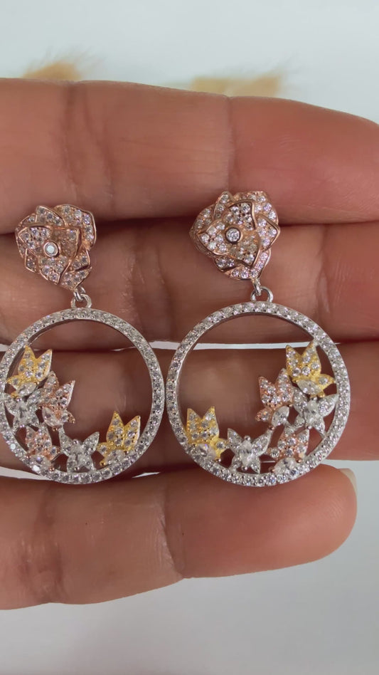 Aritos en Plata925 tres oros, mariposas y flores